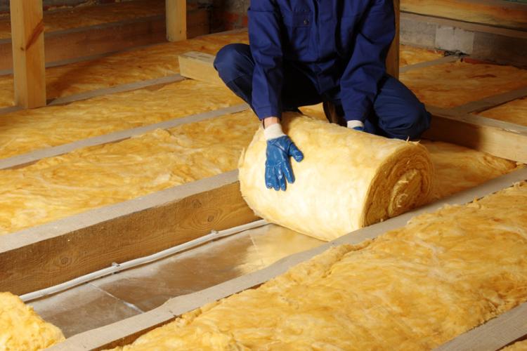 Installing proper insulation in a home.